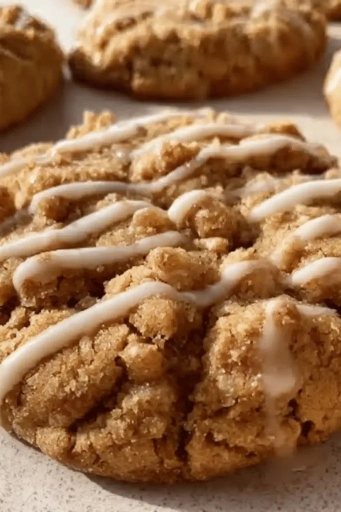 cinnamon dough and pressing an indentation for streusel topping, illustrating a crucial step before baking
