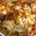 Delicious French Onion Chicken Orzo Casserole with cheese and herbs