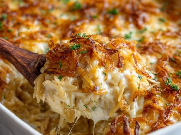 Delicious French Onion Chicken Orzo Casserole with cheese and herbs