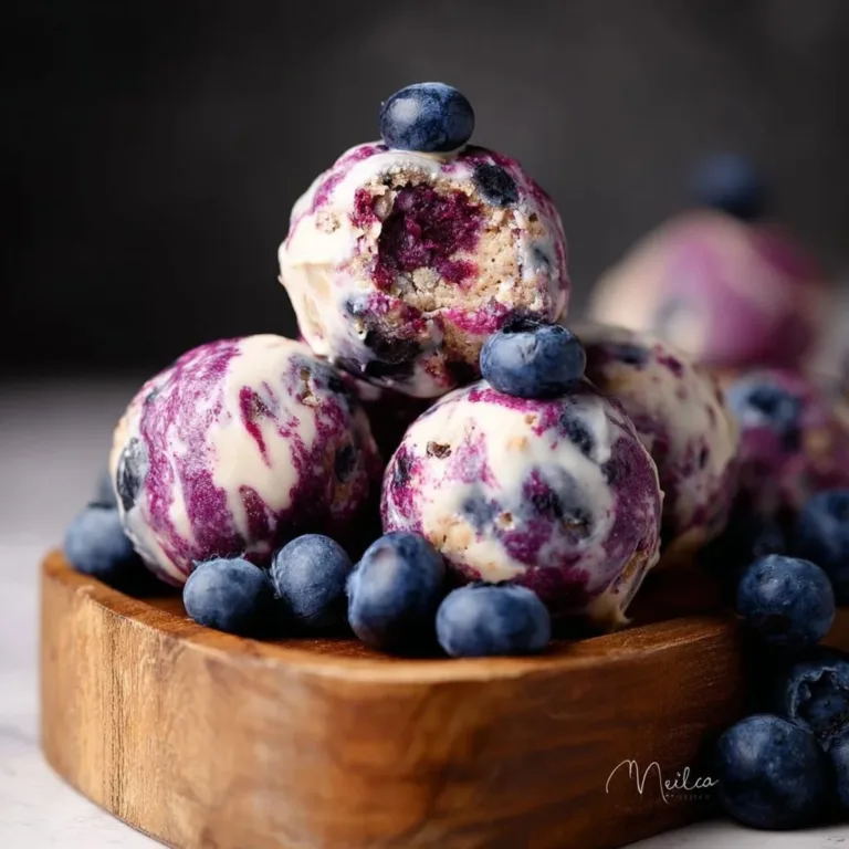 Guilt-free blueberry cheesecake protein bites for a healthy snack option.