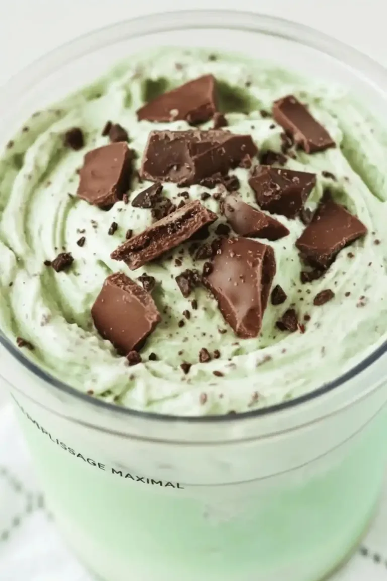 A bowl of homemade Thin Mint ice cream made with Ninja Creami.