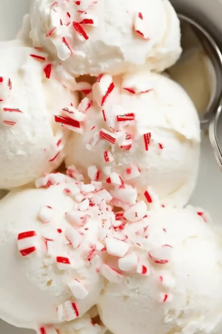 Bowl of homemade Ninja Creami Peppermint Ice Cream with festive toppings.