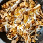 Grilled low carb BBQ chicken thighs served on a plate with fresh herbs