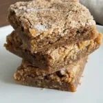 Plate of homemade Cinnamon Sugar Blondies topped with cinnamon sugar
