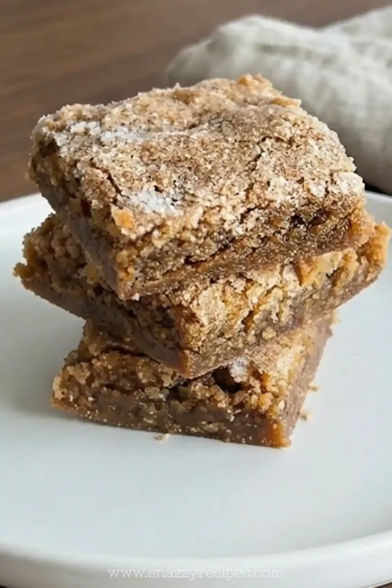 Plate of homemade Cinnamon Sugar Blondies topped with cinnamon sugar