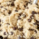 Delicious bowls of edible cookie dough with chocolate chips and sprinkles.