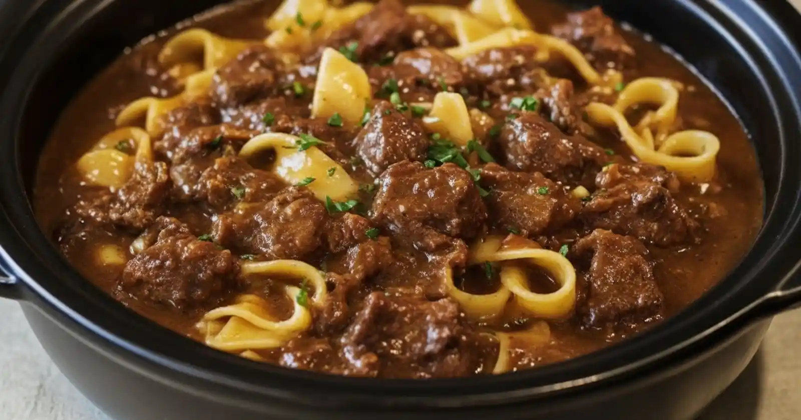 Delicious slow-cooked beef and noodles served in a bowl