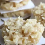 Delicious no-bake coconut cookies arranged on a plate.