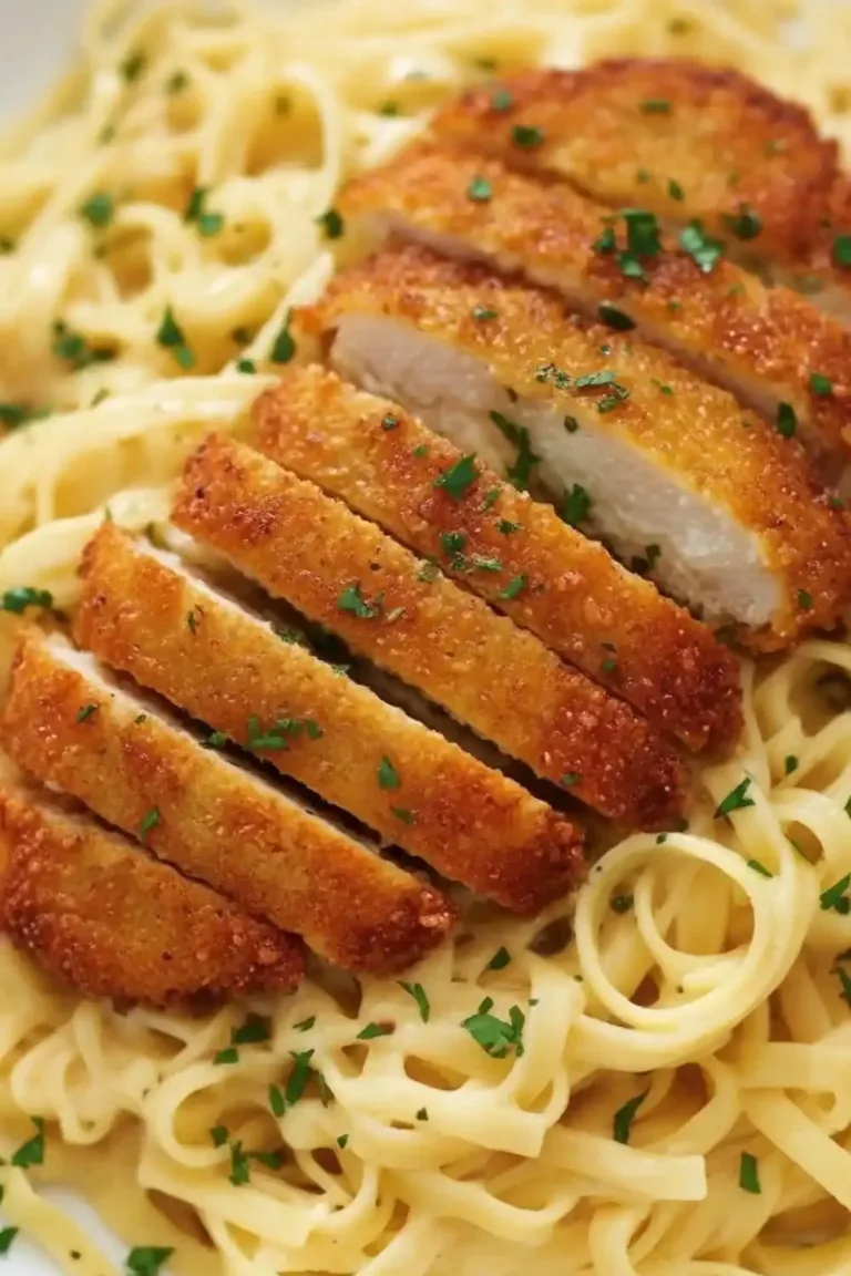 Delicious crispy chicken fettuccine alfredo served in a creamy sauce