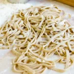 A bowl of homemade noodles, made from scratch like grandma used to make.