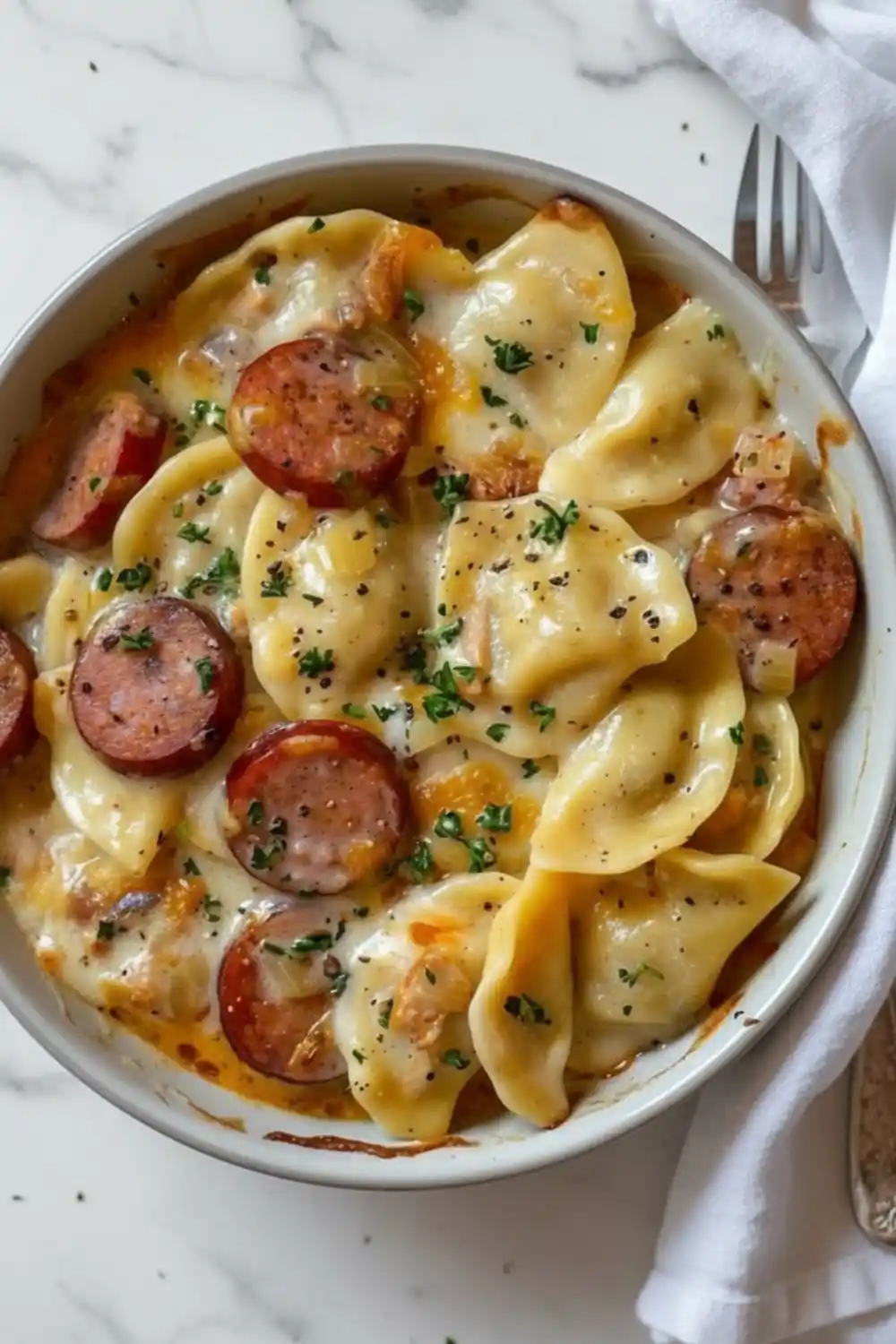 Delicious Crockpot Pierogi Casserole with Sausage served in a dish