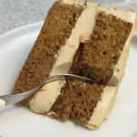 Delicious Caramel Chai Cake topped with caramel drizzle and chai spices