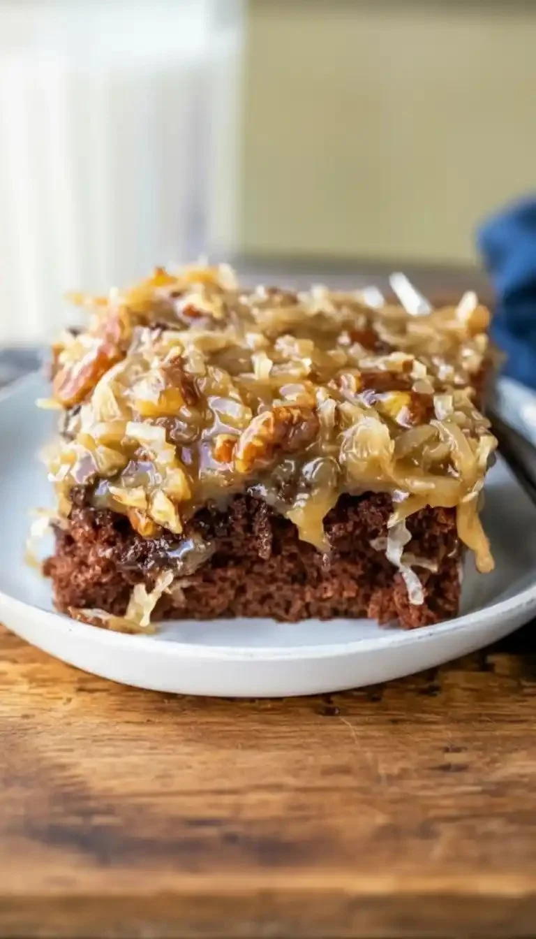 Delicious chocolate sheet cake topped with frosting and sprinkles