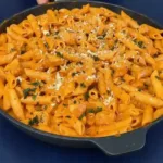 Creamy Spicy Chicken Pasta with red peppers and herbs