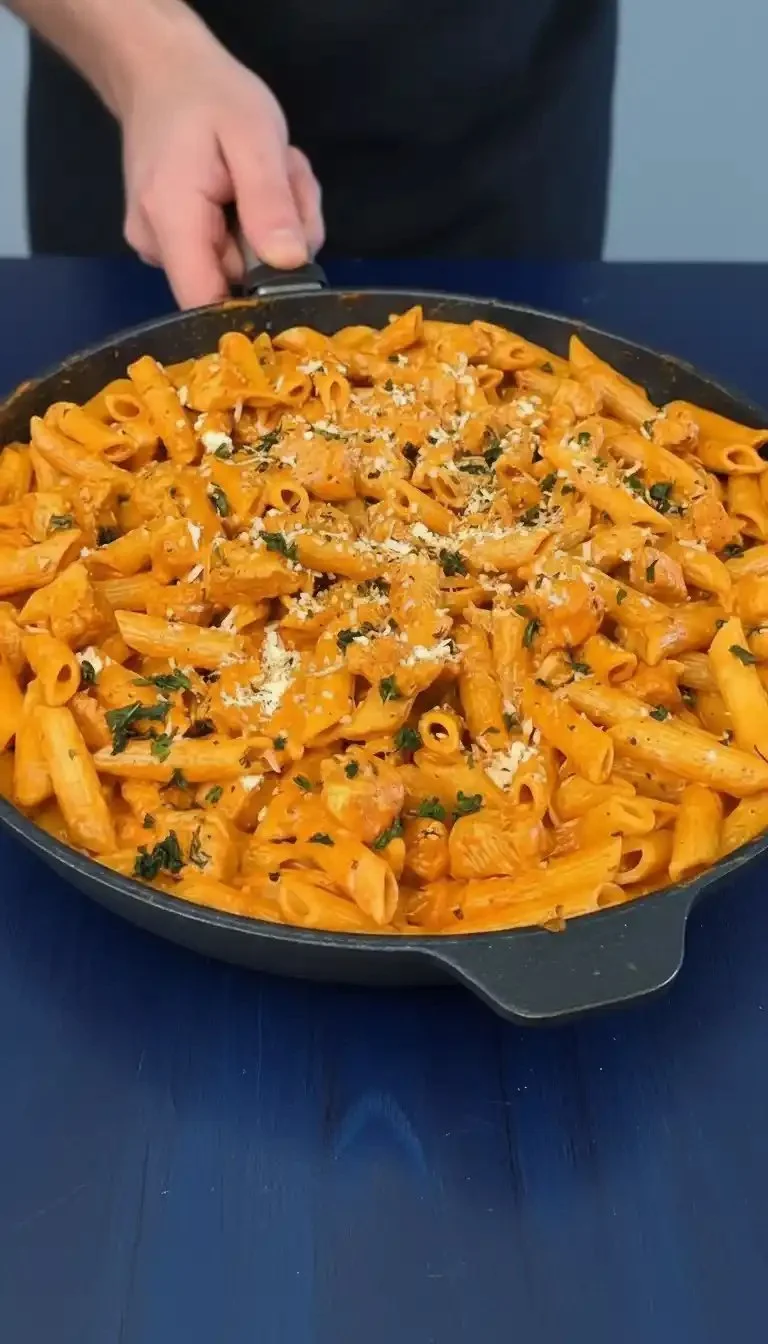 Creamy Spicy Chicken Pasta with red peppers and herbs